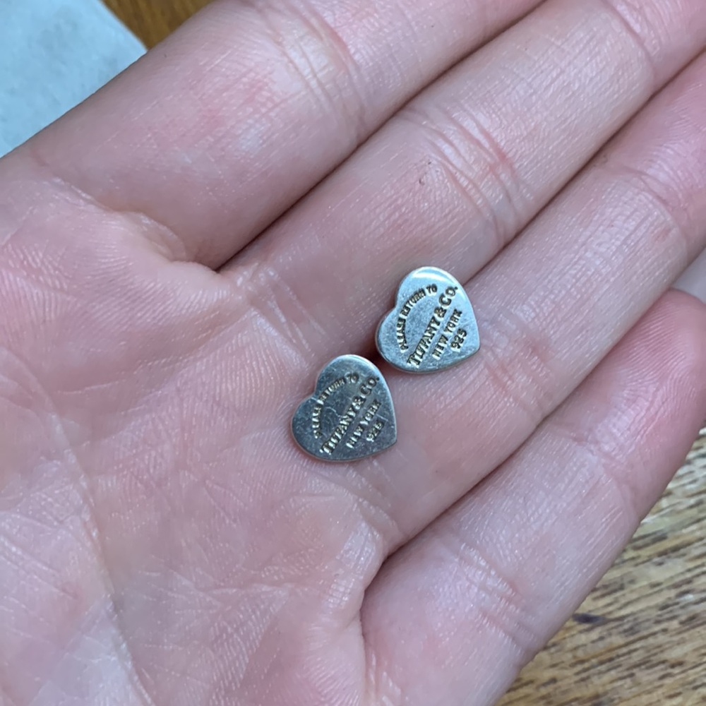 Tiffany & Co. stud earrings.